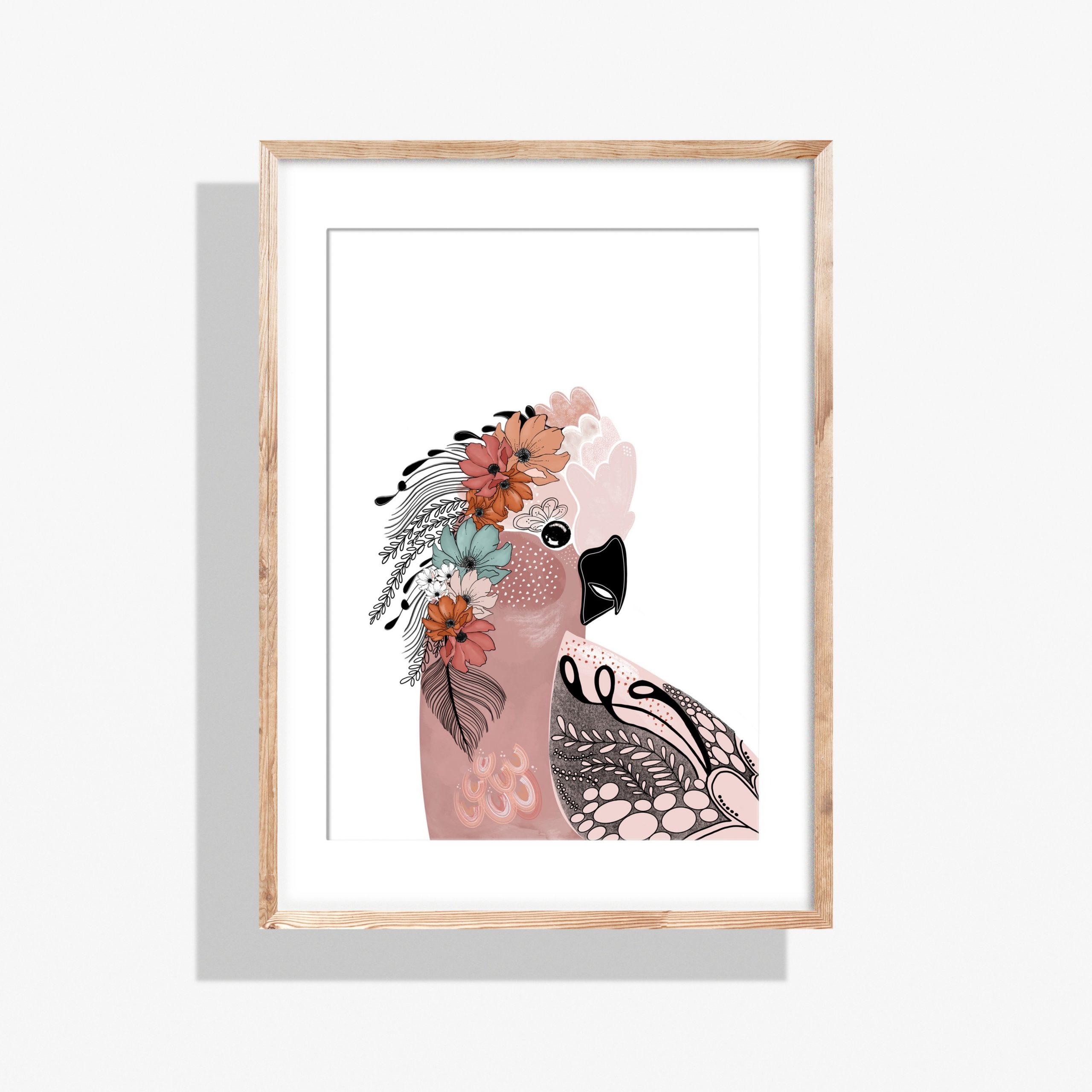 Matilda pink galah art print by Australian artist Rebecca A Moore shown framed in a natural timber frame